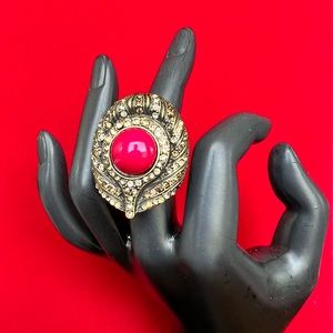 NWT Gold ring w/ rhinestones and Red center stone. OS